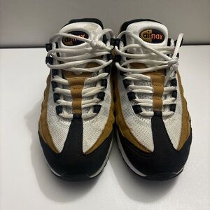 Nike Sneakers in White, Black, and Brown